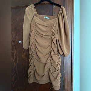 Mini dress with mid length sleeves. Very flattering.
